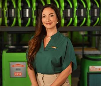 SERVPRO employee in green shirt posing for crew photo.